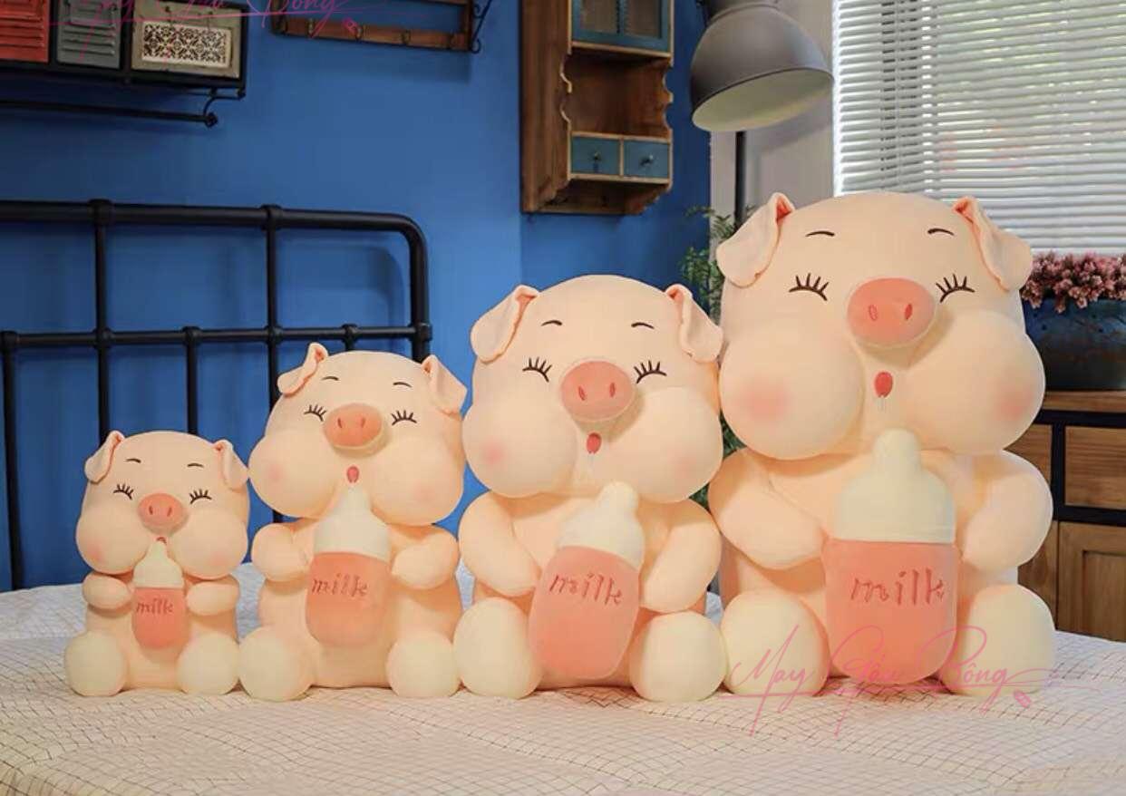 Heo Bông ôm Bình Sữa