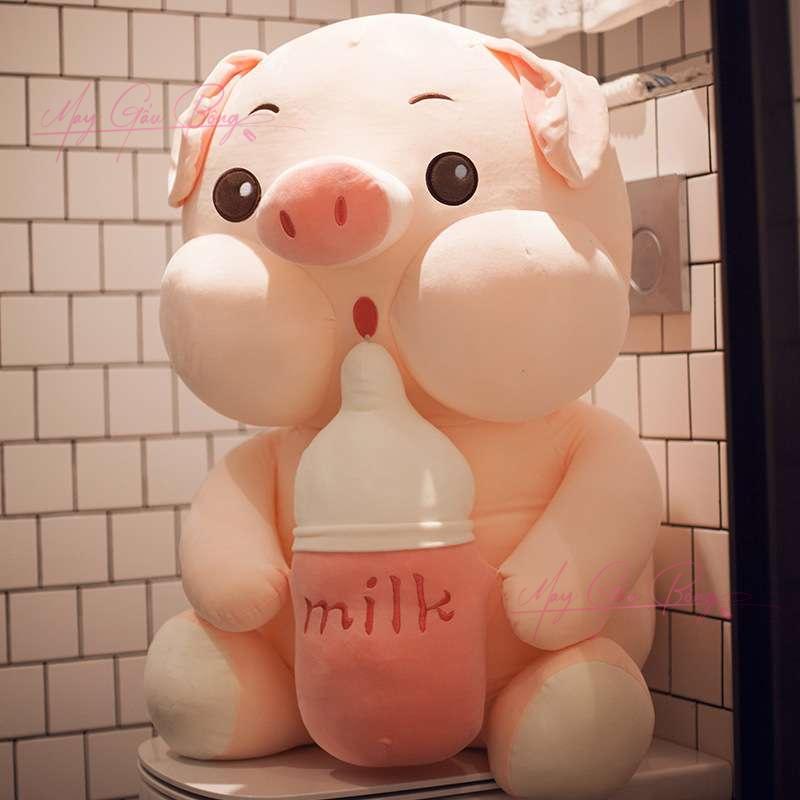 Heo Bông ôm Bình Sữa